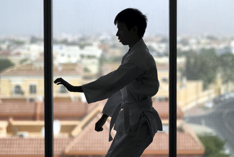 Dubai, United Arab Emirates - July 20, 2019: Chua Ken Yu. Cathy Darnell is the only female Aikido instructor in Dubai and is a 4th dan, she has the oldest dojo in the country, Zanshinkan Aikido club Dubai is celebrating our 25th anniversary in 2020. Saturday the 20th of July 2019. Al Barsha, Dubai. Chris Whiteoak / The National