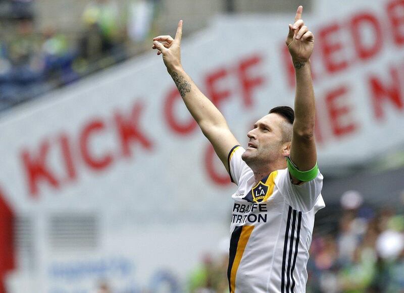 Los Angeles Galaxy forward Robbie Keane celebrates after he scored a goal against the Seattle Sounders on Saturday, July 9, 2016 in Seattle. Ted S Warren / AP Photo