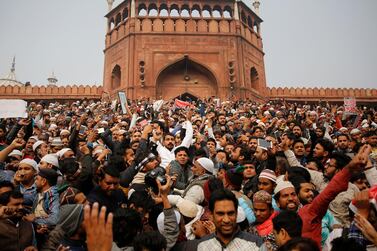 Dalit leader and Bhim Army founder Chandrashekhar Azad, center in white, join others for a protest against the Citizenship Amendment Act after Friday prayers outside Jama Masjid in New Delhi, India, Friday, Dec. 20, 2019. Police banned public gatherings in parts of the Indian capital and other cities for a third day Friday and cut internet services to try to stop growing protests against a new citizenship law that have so far left more than 10 people dead and more than 4,000 others detained. (AP Photo/Altaf Qadri)