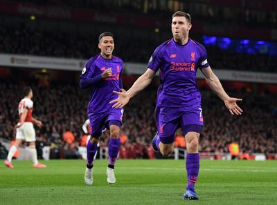 LONDON, ENGLAND - NOVEMBER 03:  James Milner of Liverpool celebrates after he scores his sides first goal during the Premier League match between Arsenal FC and Liverpool FC at Emirates Stadium on November 3, 2018 in London, United Kingdom.  (Photo by Michael Regan/Getty Images)
