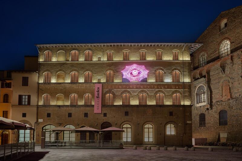 A neon-pink eye on the Gucci Garden facade. Courtesy Gucci