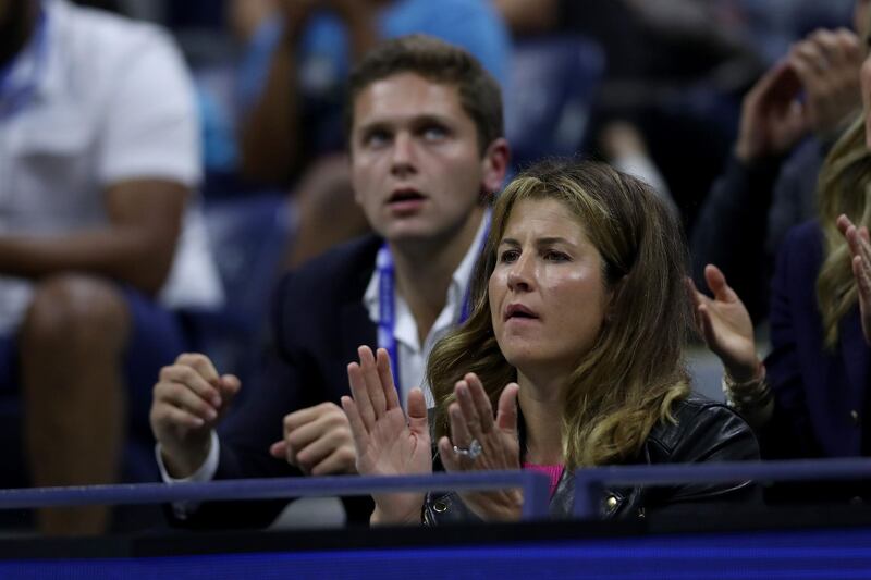 Mirka Federer watches as her husband Roger Federer takes on Sumit Nagal of India. AFP