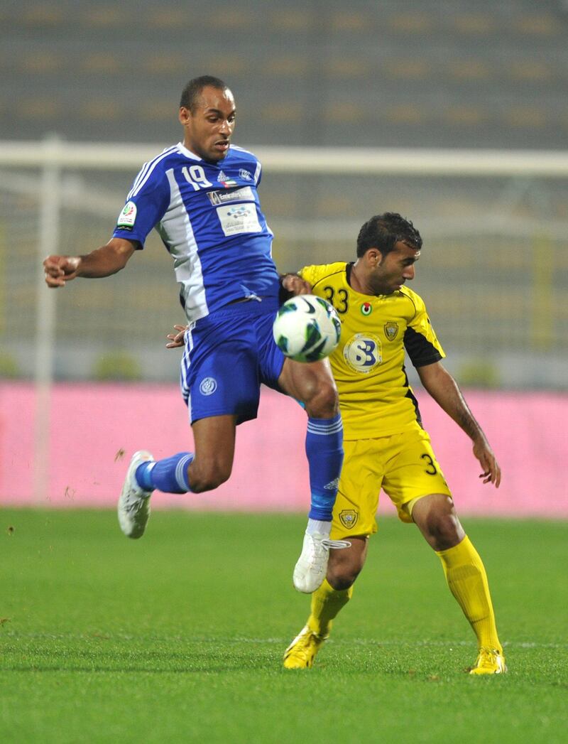 United Arab Emirates - Dubai - Saturday -26/01/2013 -  Al Wasl (yellow) team match with Al Nasr (blue) team within Etisalat league at the Al Wasl Stadium in Dubai. Ashraf Umrah / Al Ittihad