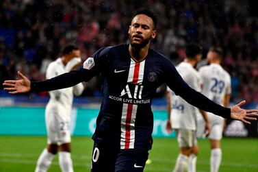 Paris Saint-Germain's Brazilian forward Neymar celebrates after scoring the winner at Lyon on Sunday. AFP