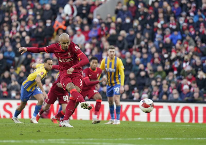 Fabinho scores Liverpool's second goal from the penalty spot at Anfield. EPA