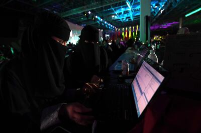 CORRECTION - Saudi women attend a hackathon in Jeddah on July 31, 2018, prior to the start of the annual Hajj pilgrimage in the holy city of Mecca.
More than 3,000 software developers and 18,000 computer and information-technology enthusiasts from more than 100 countries take part in Hajj hackathon in Jeddah until August 3. / AFP PHOTO / Amer HILABI / The erroneous byline appearing in the metadata of this photo by Amer HILABI  has been modified in AFP systems in the following manner: [Amer Hilabi] instead of [Matthieu Clavel]. Please immediately remove the erroneous mention[s] from all your online services and delete it (them) from your servers. If you have been authorized by AFP to distribute it (them) to third parties, please ensure that the same actions are carried out by them. Failure to promptly comply with these instructions will entail liability on your part for any continued or post notification usage. Therefore we thank you very much for all your attention and prompt action. We are sorry for the inconvenience this notification may cause and remain at your disposal for any further information you may require.”