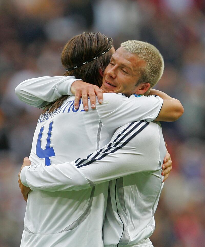 MADRID, SPAIN - MAY 26:  David Beckham (R) of Real Madrid celebrates with Sergio Ramos after Real scored their first goal during the Primera Liga match between Real Madrid and Deportivo La Coruna at the Santiago Bernabeu stadium on May 26, 2007 in Madrid, Spain.  (Photo by Denis Doyle/Getty Images)