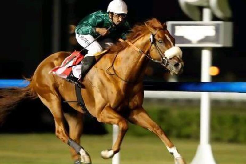 Ahmad Ajtebi charges the wire on Capponi to win at Meydan Racecourse in March 2012