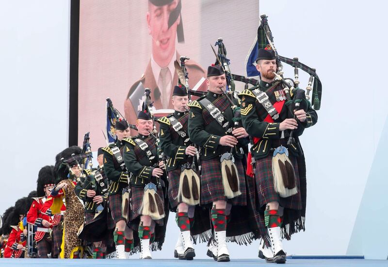 Pipers of the 4th battalion Royal regiment of Scotland play during an event to commemorate the 75th anniversary of the D-Day landings, in Portsmouth, southern England.  AFP