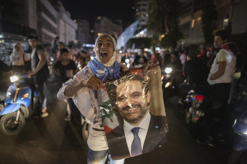 BEIRUT, LEBANON - OCTOBER 30: Supporters of Lebanese Prime Minister Saad al Hariri gather to show support on October 30, 2019 in Tariq Al Jadideh, Beirut, Lebanon. After 14 days of unrest, protesters opened roads across the country today, declaring a 72 hour break for reforms to be implemented before re-taking the streets if their demands are not met. (Photo by Sam Tarling/Getty Images)