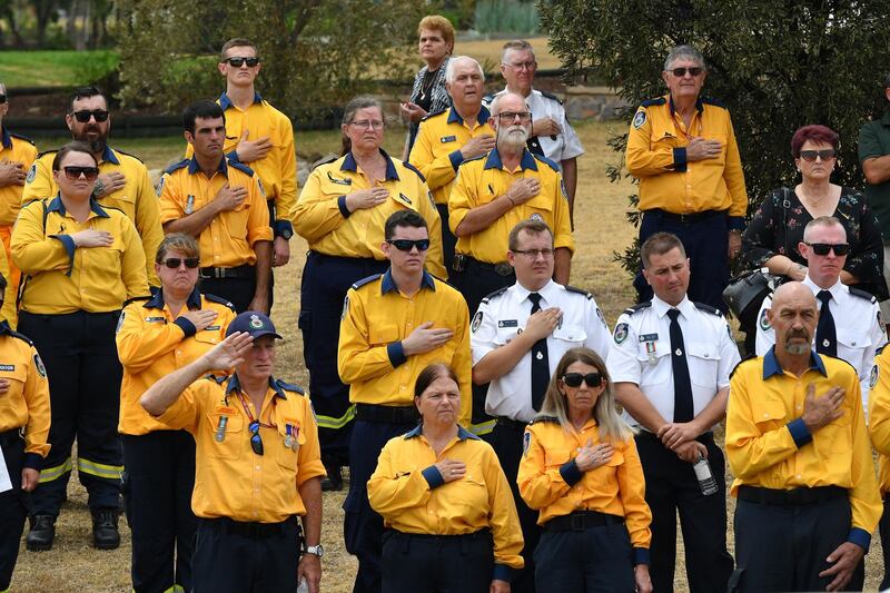 RFS volunteers pay tribute at the funeral for NSW RFS volunteer Andrew O'Dwyer at Our Lady of Victories Catholic Church in Horsley Park, Sydney. Getty Images