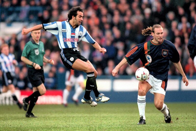 Paolo Di Canio of Sheffield Wednesday (left) shoots at goal before Newcastle United's Darren Peacock (right) can make a tackle  (Photo by Michael Steele/EMPICS via Getty Images)