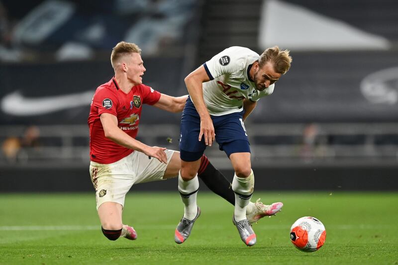 Scott McTominay tackles Harry Kane during the Premier League match between Tottenham Hotspur and Manchester United. Getty Images