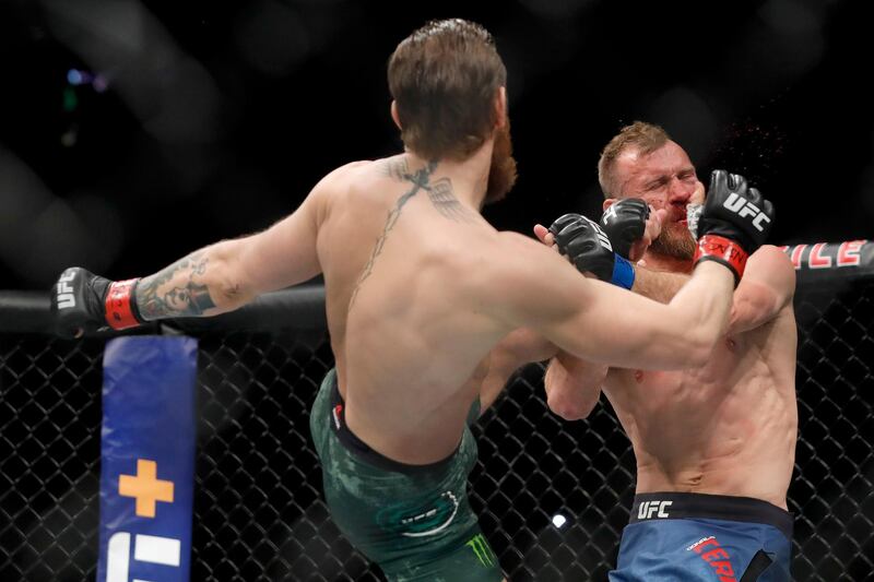 LAS VEGAS, NEVADA - JANUARY 18: Conor McGregor lands a kick to the face of Donald Cerrone in the first round in a welterweight bout during UFC246 at T-Mobile Arena on January 18, 2020 in Las Vegas, Nevada.   Steve Marcus/Getty Images/AFP