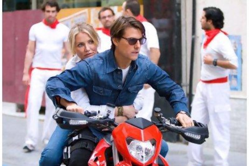 Tom Cruise as Roy and Cameron Diaz as June prepare for the ride of their lives as they flee pursuing assassins through the streets of Seville in their latest movie Knight and Day.