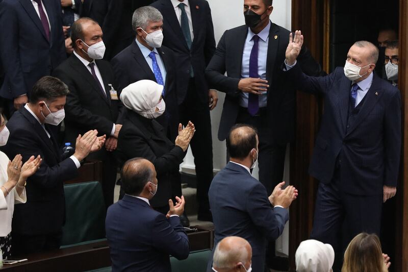 President Recep Tayyip Erdogan waves as he arrives to deliver a speech to the Grand National Assembly of Turkey in Ankara on Wednesday. Photo: AFP