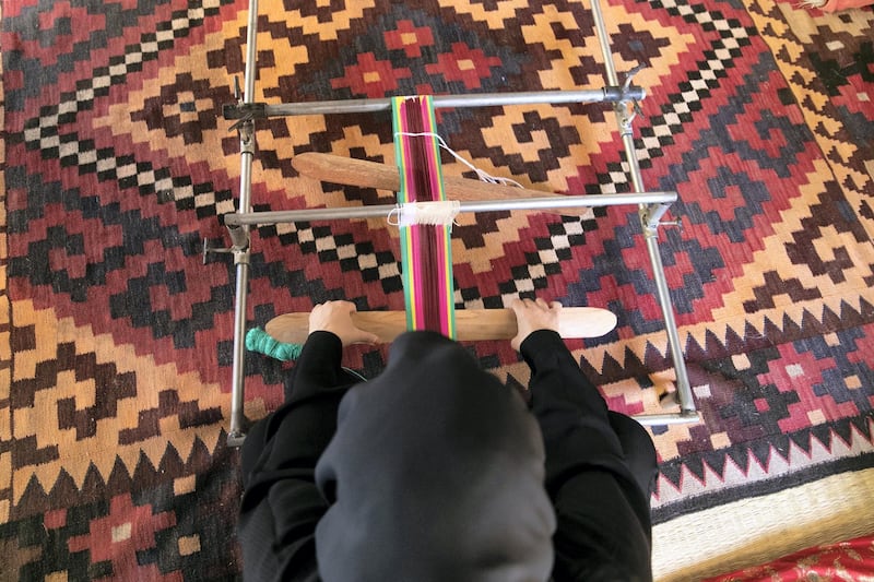 ABU DHABI, UNITED ARAB EMIRATES - JUNE 12, 2018. 

Umm Mohammed Al Kaabi works on Sadu, at a handicrafts workshop at Al Ain Palace Museum. Sadu is handwoven wool traditionally used in making Bedouin tents and carpets.

Running several days a week throughout the year, a group of women teach the community Telli, Khoos, and Sadu.

Located on the western edge of Al Ain Oasis, the Palace of the late Sheikh Zayed bin Sultan Al Nahyan was built in 1937. It was converted into a museum in 1998 and opened to the public in 2001. 

(Photo by Reem Mohammed/The National)

Reporter: 
Section: WK
