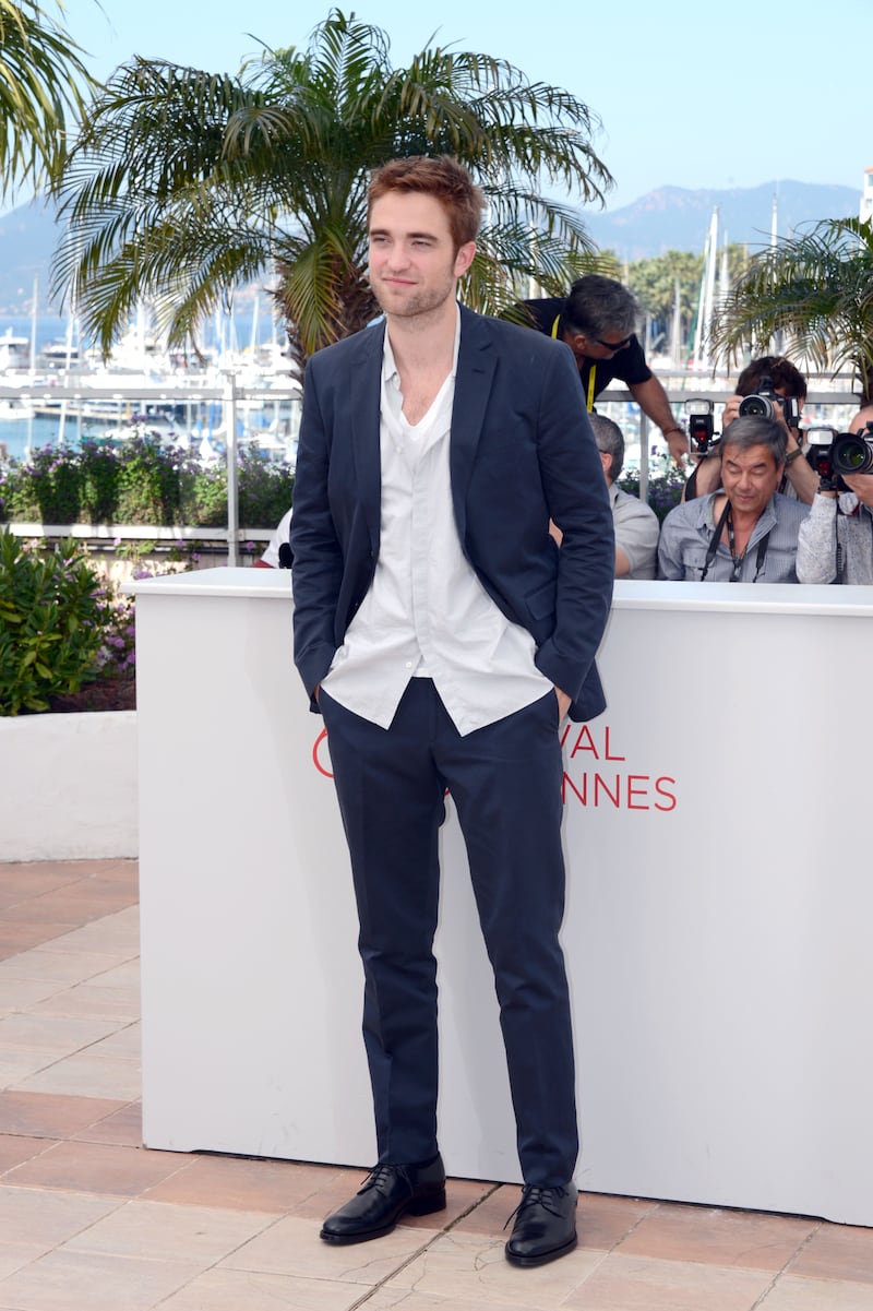 In a blue suit and white shirt at the 'Cosmopolis' photocall during the 65th Annual Cannes Film Festival on May 25, 2012. Getty Images