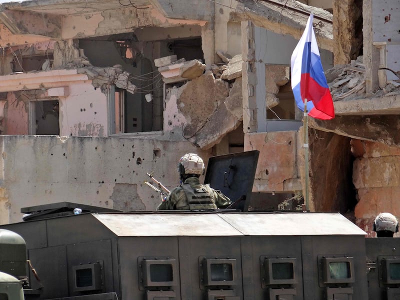Russian troops in the Syrian district of Deraa Al Balad. AFP