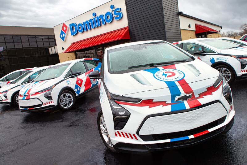 A closer look at a Chevy Bolt EV with Domino's branding.