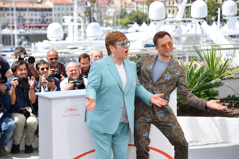 Sir Elton and Taron Egerton attend a Rocketman photocall during the 72nd Annual Cannes Film Festival on May 16, 2019. Getty Images