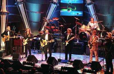 From left, Randy Meisner, Timothy Schmit, Glenn Frey, Don Felder, Joe Walsh, Don Henley and Bernie Leadon were inducted into the Rock and Roll Hall of Fame in 1998. AFP