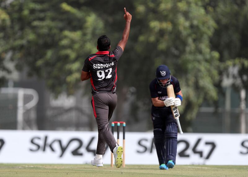 UAE bowler Junaid Siddique celebrates taking the wicket of Namibia opener Craig Williams for 11.