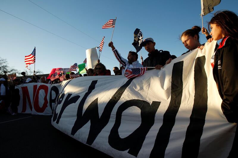 Demonstrators take part in the 'March for Truth: Stop the Wall, Stop the Lies' during the visit of Donald Trump to El Paso. Reuters