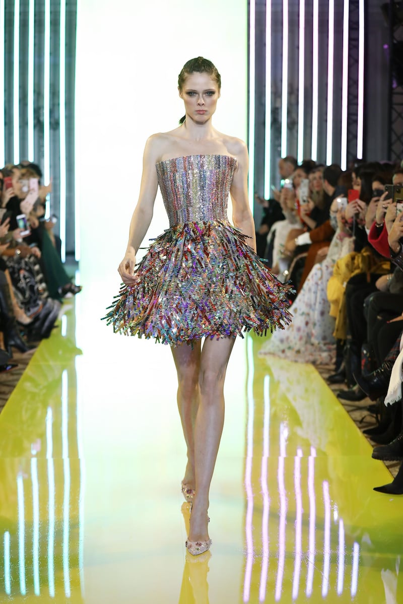 Mini dress with a strapless square deep-split corset embellished with scroll sequins, and a voluminous skirt of matte and glossy sequins sheets
