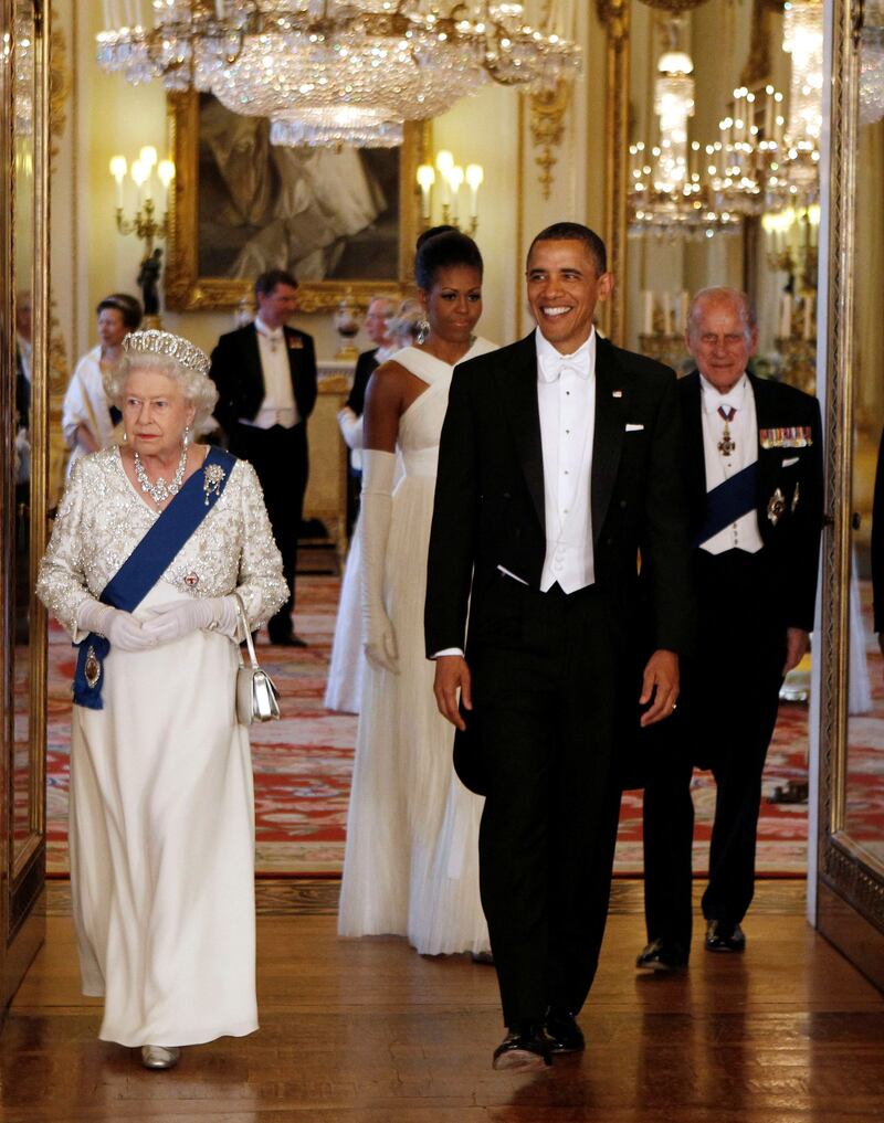 The Obamas walk out to pose with the queen and Prince Phillip before a state dinner at Buckingham Palace. Reuters