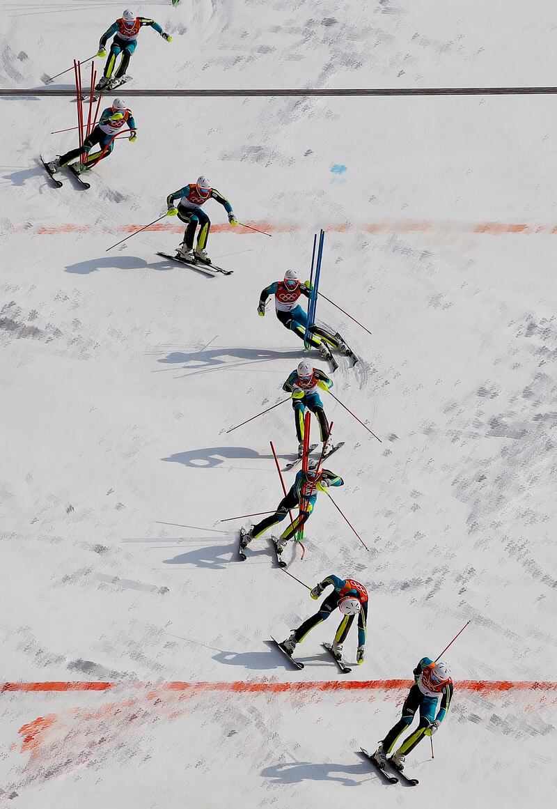 In this multiple exposure photo, gold medalist Andre Myhrer, of Sweden, makes his final run in the men's slalom at the 2018 Winter Olympics in Pyeongchang, South Korea. Charlie Riedel / AP Photo