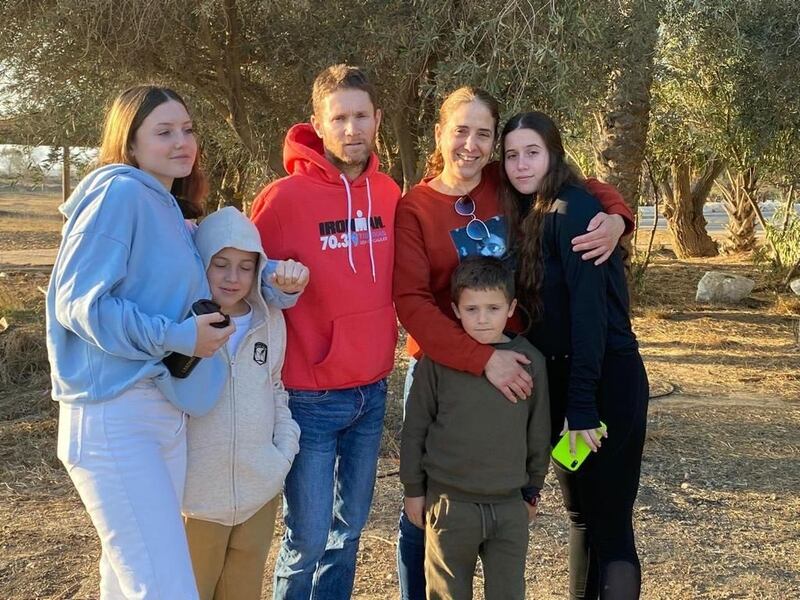 Nadav Goldshtein, centre, was killed by Hamas gunmen along with his daughter Yam Goldshtein Almog, far right, at their home in Kibbutz Kfar Aza, while his wife Chen Goldshtein Almog, daughter Agam, and sons Gal and Tal were taken hostage. Photo: Goldshtein-Almog family