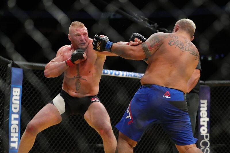 Brock Lesnar punches Mark Hunt, right, during the UFC 200 event at T-Mobile Arena on July 9, 2016 in Las Vegas, Nevada. Rey Del Rio / Getty Images