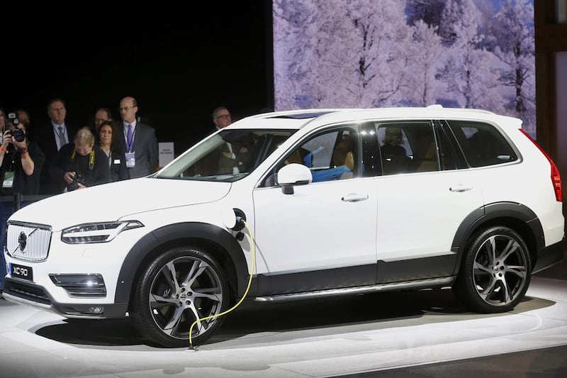 Volvo revealed its new XC-90, which features a unique hybrid system with a gasoline engine and attached electric motor powering the front wheels and an electric motor powering the rear wheels. Mark Blinch / Reuters