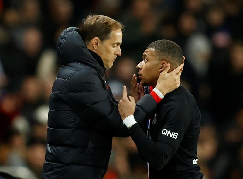 Paris Saint-Germain manager Thomas Tuchel with Kylian Mbappe after the French attacker was substituted against Montpellier. Reuters