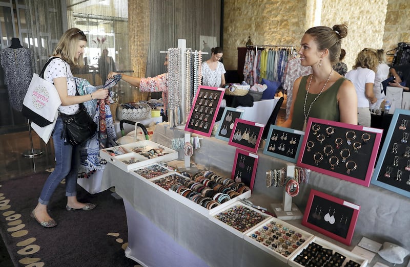 ABU DHABI , UNITED ARAB EMIRATES , SEP 24  ��� 2017 : - People looking and buying different items like clothes , jewellery , books , decorative items , shoes etc. during the Shopping Soiree held at The Westin Abu Dhabi Golf Resort & Spa in Abu Dhabi. ( Pawan Singh / The National )