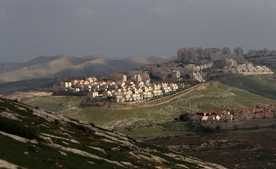 A picture taken from the E1 corridor, a super-sensitive area of the occupied West Bank, shows Israeli settlement of Maale Adumin in the background on February 25, 2020. Netanyahu pledged to build 3,500 new settler homes in a super-sensitive area of the occupied West Bank, just a week before a tight general election. "I gave immediate instructions for a permit to deposit (plans) for the construction of 3,500 units in E1," Netanyahu said. / AFP / AHMAD GHARABLI
