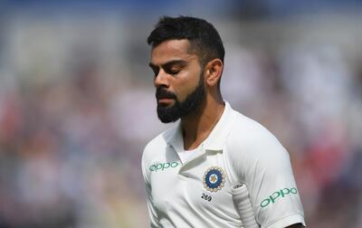 BIRMINGHAM, ENGLAND - AUGUST 04:  India batsman Virat Kohli reacts after being dismissed during day 4 of the First Specsavers Test Match between England and India at Edgbaston on August 4, 2018 in Birmingham, England.  (Photo by Stu Forster/Getty Images)