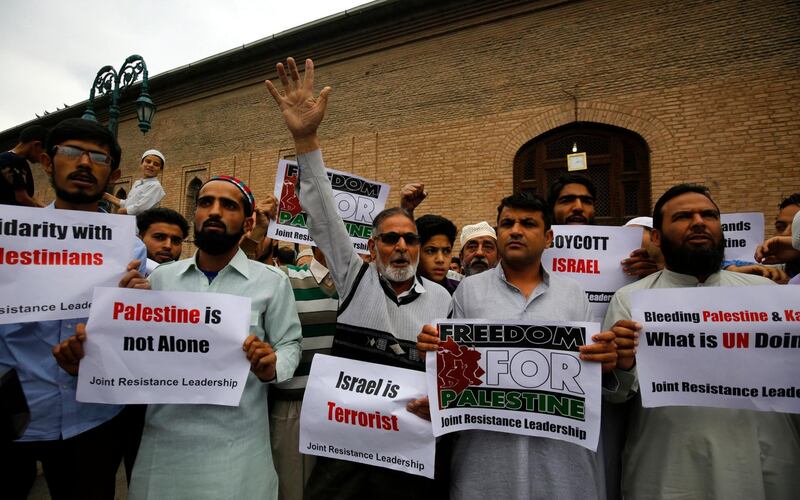 Kashmiri protesters assembled after Friday prayers outside Jamia Masjid to protest against killing of Palestinians by Israeli troops in Gaza. Farooq Khan / EPA
