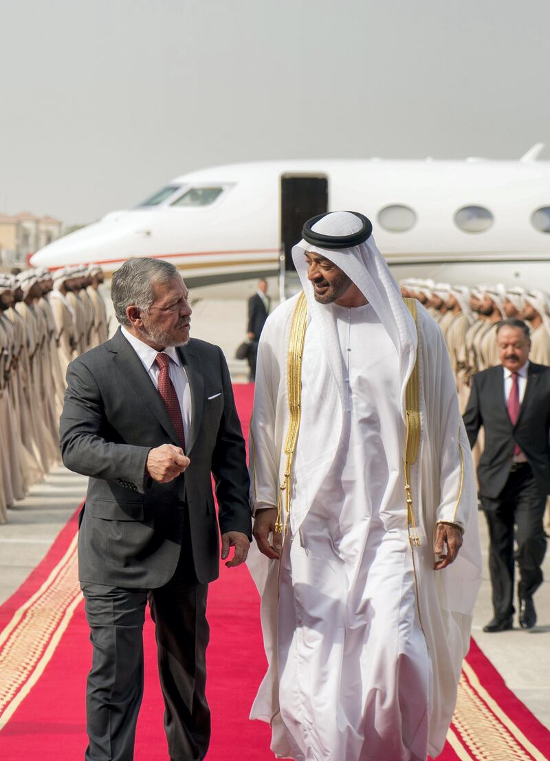 ABU DHABI, UNITED ARAB EMIRATES - July 27, 2018: HH Sheikh Mohamed bin Zayed Al Nahyan, Crown Prince of Abu Dhabi and Deputy Supreme Commander of the UAE Armed Forces (R), receives HM King Abdullah II, King of Jordan (L), at Al Bateen Airport.

( Rashed Al Mansoori / Ministry of Presidential Affairs )
---