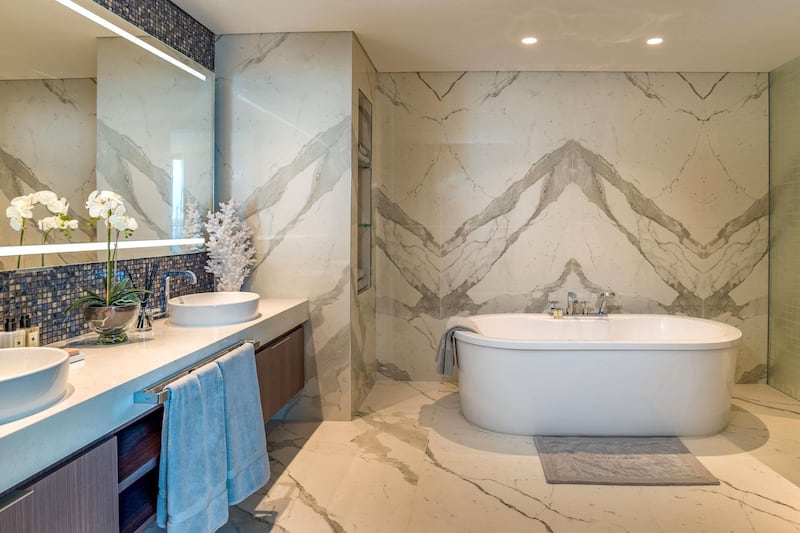 There's no shortage of marble in the bathrooms. Courtesy LuxuryProperty.com