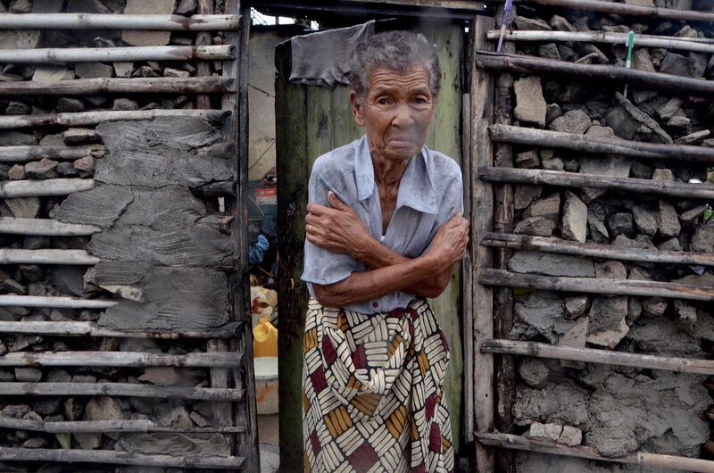 A shivering displaced woman in Beira. AFP