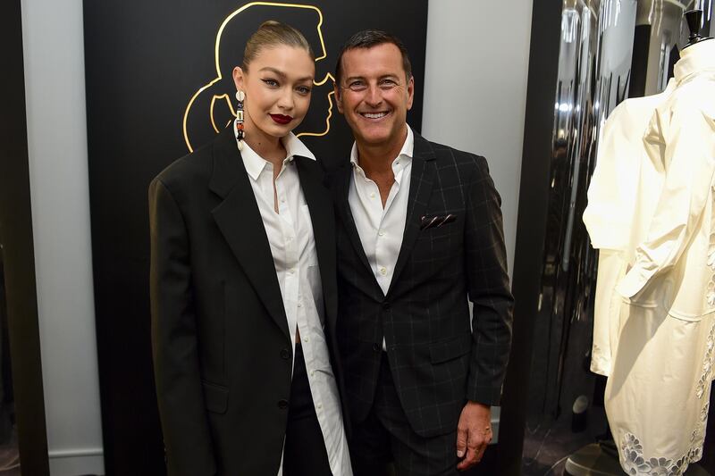 Gigi Hadid and Pier Paolo Righi attend the Tribute to the Karl Lagerfeld: The White Shirt Project exhibition as part of Paris Fashion Week on September 25, 2019. Getty Images