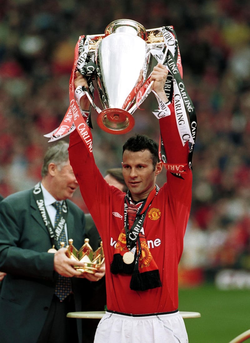 Giggs celebrates with the Premier League trophy in May 2001. Getty Images