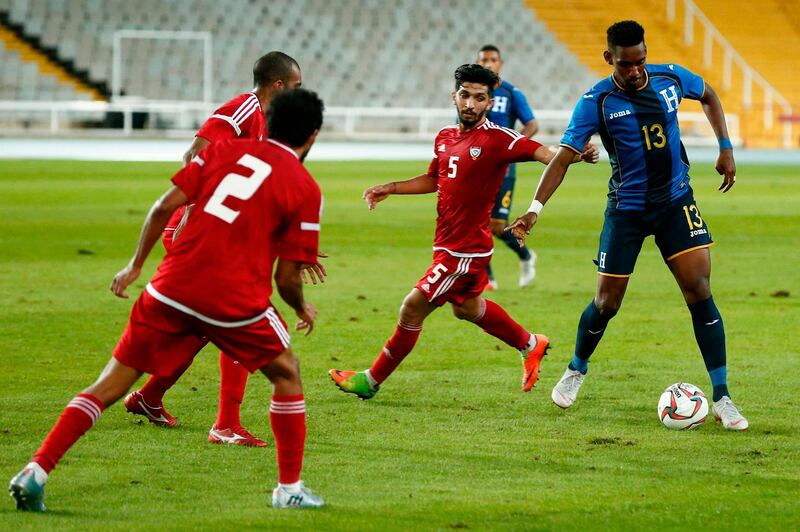 Honduras' forward Bryan Rochez (R) controls the ball during a friendly football match between United Arab Emirates and  Honduras at the Estadi Olimpic Lluis Companys in Barcelona. AFP