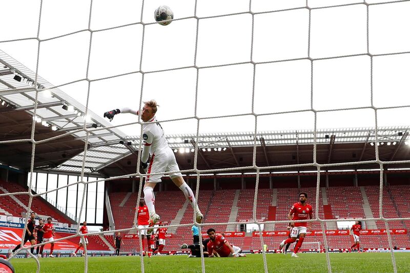 Mainz goalkeeper Florian Muller cannot stop Augsburg's Florian Niederlechnershot hitting the back of the net. EPA