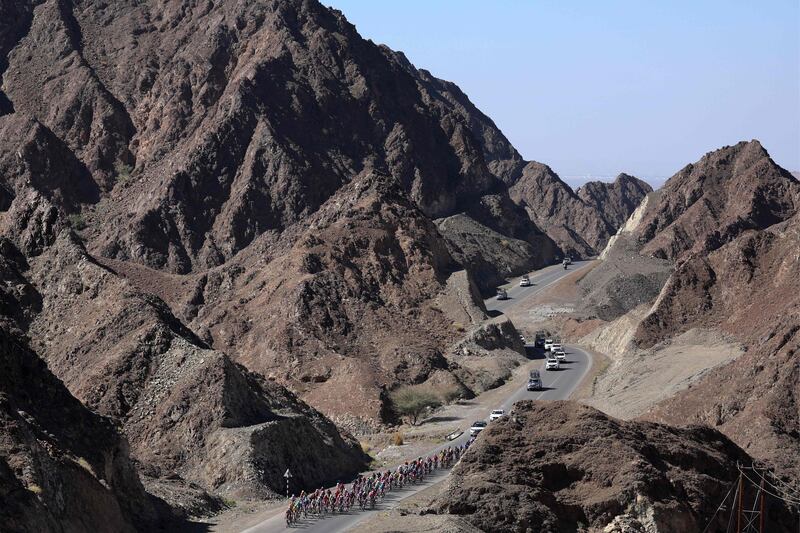 The peloton during the fourth stage of the 2023 Tour of Oman, from Izki to Yitti Hills. AFP