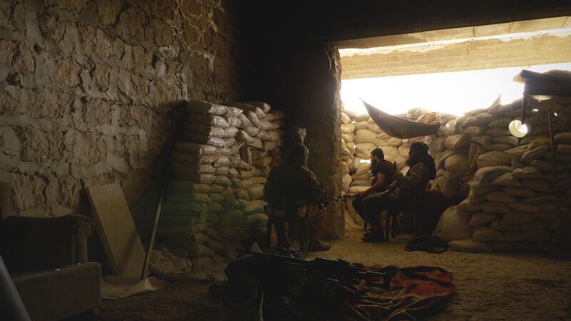 A movie still of Dugma: The Button by Paul Salahadin Refsdal showing Abu Basir Al Britani. Courtesy Journeyman Pictures