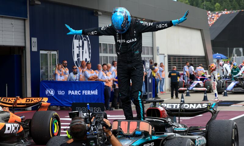 Mercedes driver George Russell celebrates winning the Austrian Grand Prix. EPA