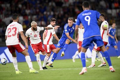 Davide Frattesi completed the rout with Italy's fourth goal in injury time. AP
